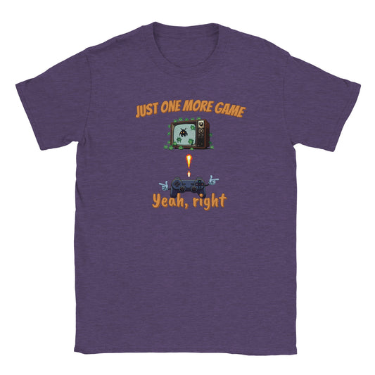 A purple  t-shirt with space-invader aliens coming out of and crawling over a retro television set. The words, "Just one more game" in pale orange above.

There's a game controller below the television  firing at the aliens. The words, "Yeah, right" are below it in pale orange
 game controller with the words, "Just one more game" in pale red with slight yellow drop shadow just above it. 

Beneath the controller are the words, "Yeah, right", also in pale red with slight yellow drop shadow